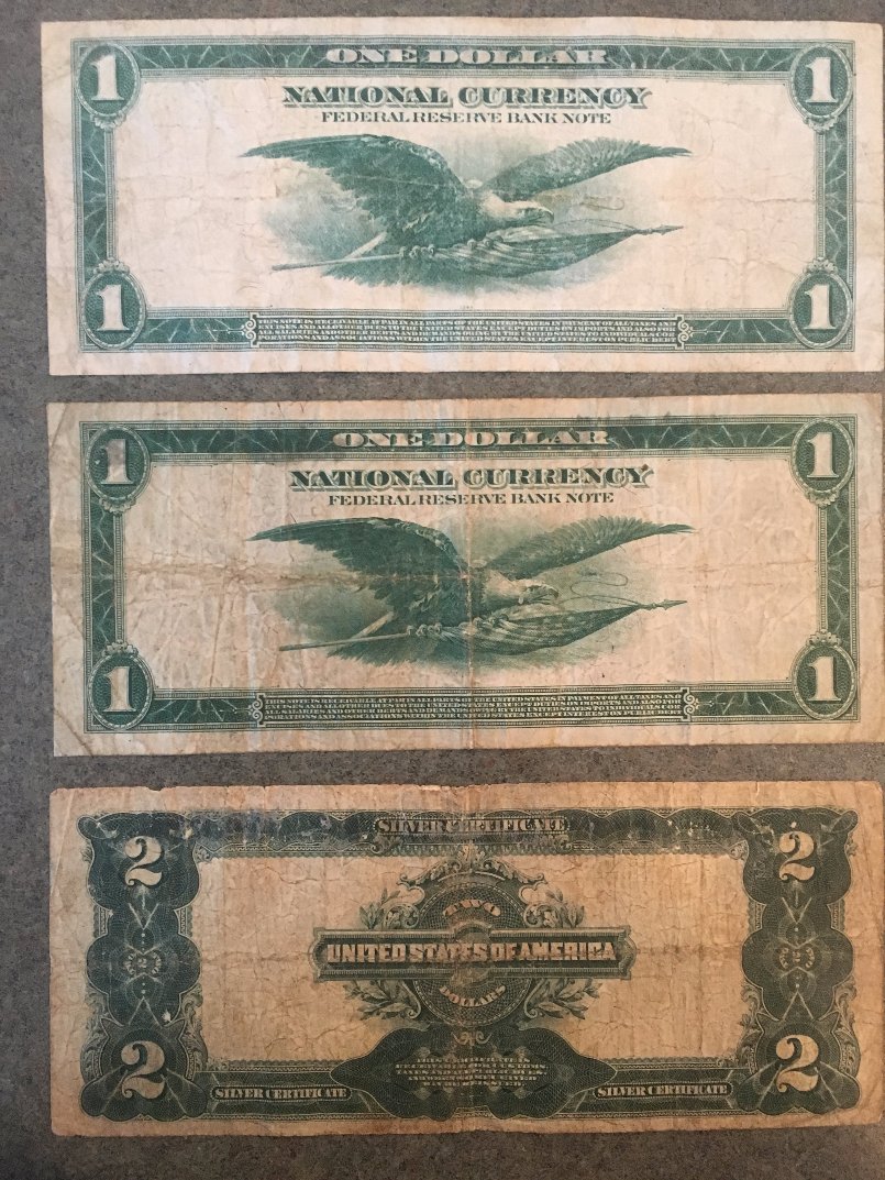 A-Set-Of-Early-US-Currency-Including-Black-Eagles,-Educational-$2,-Etc